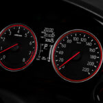 5. Sporty Meter Cluster with Red Accent